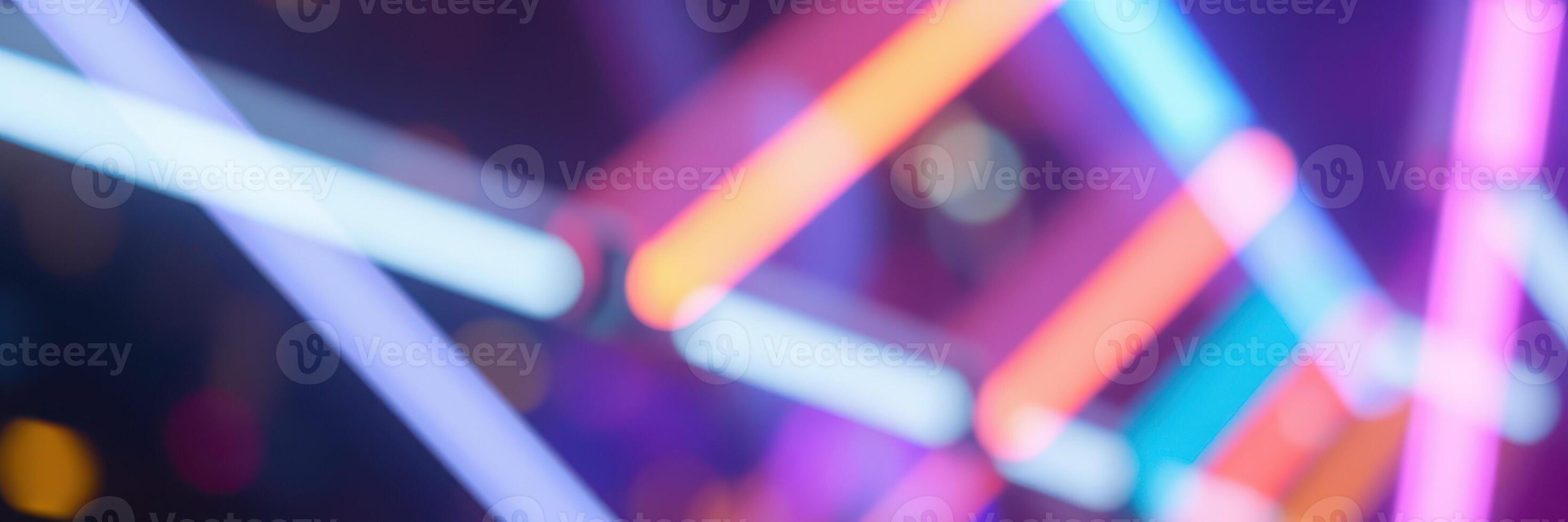 Vibrant neon lights create an energetic atmosphere at a night event in the city photo