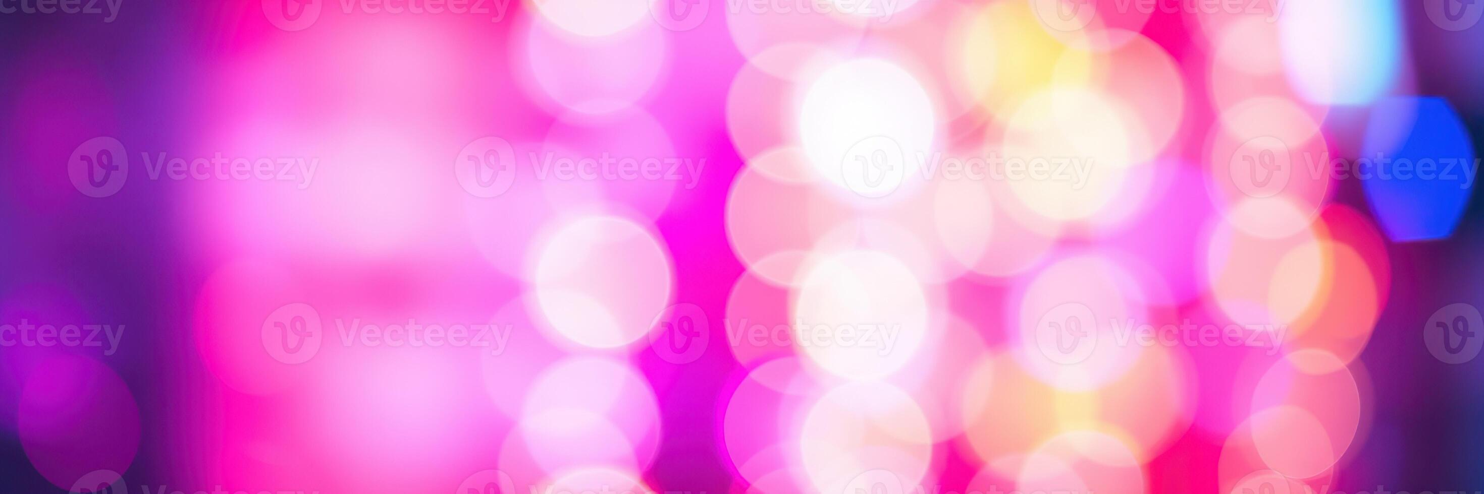 Colorful abstract lights create a vibrant atmosphere in a nightlife setting during an evening event photo