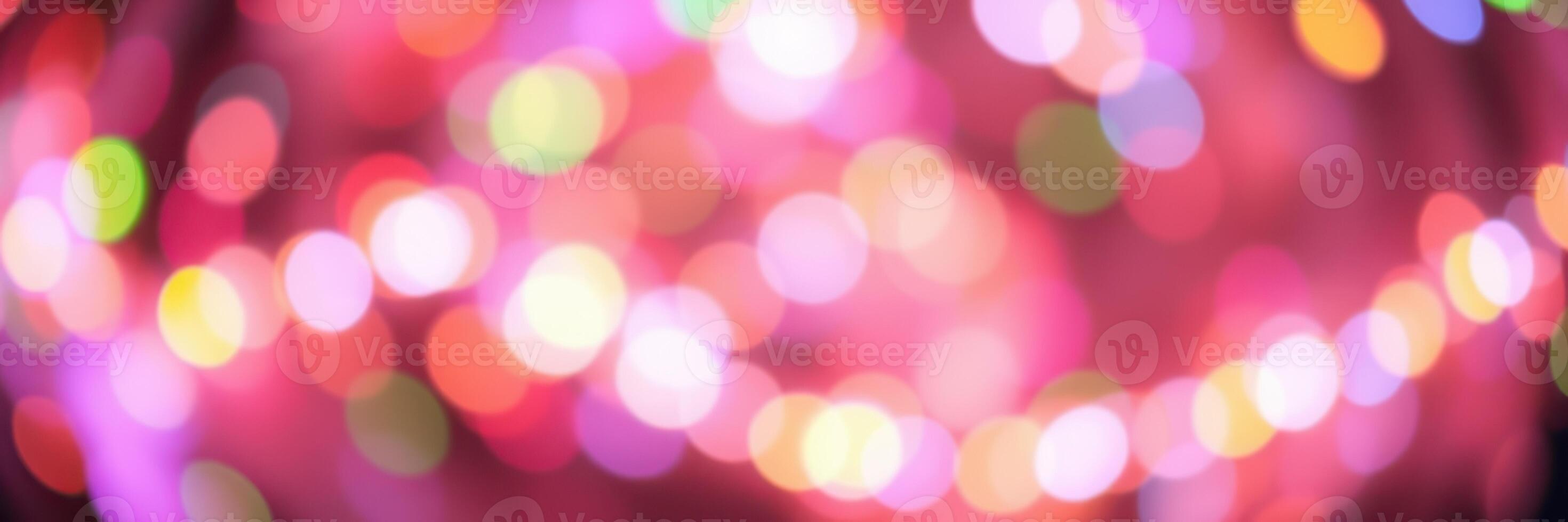 Colorful bokeh lights create a vibrant atmosphere during a festive celebration at night photo