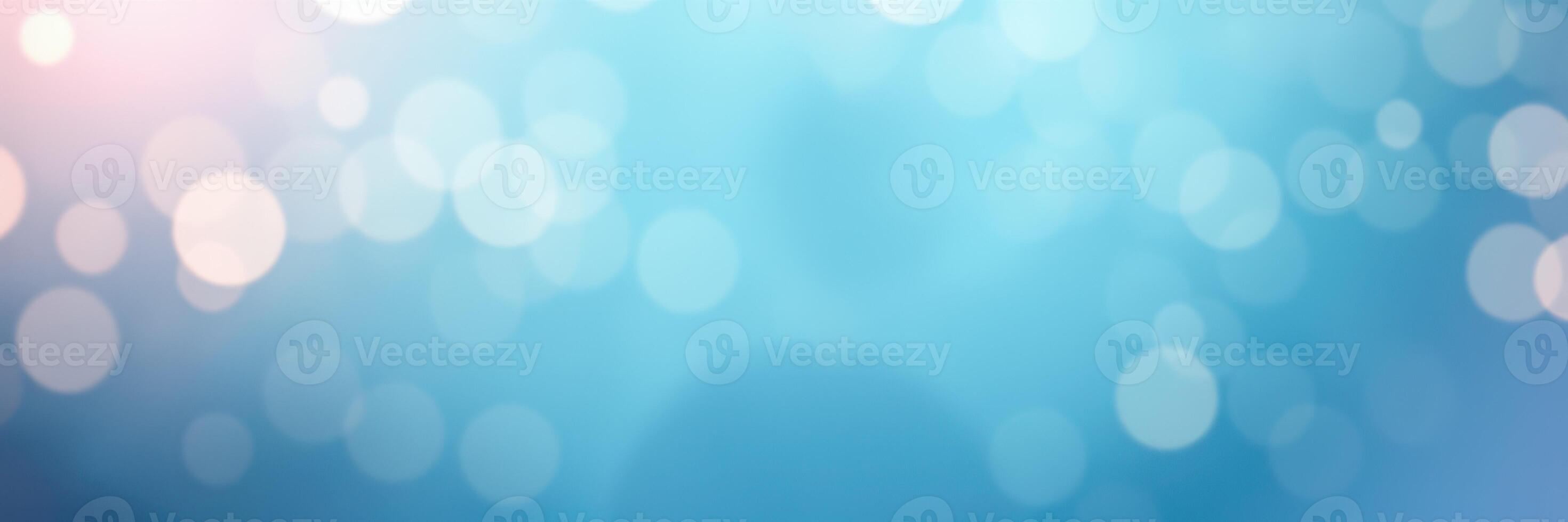 Soft blue background with circular bokeh lights creating a dreamy atmosphere for various designs and projects photo