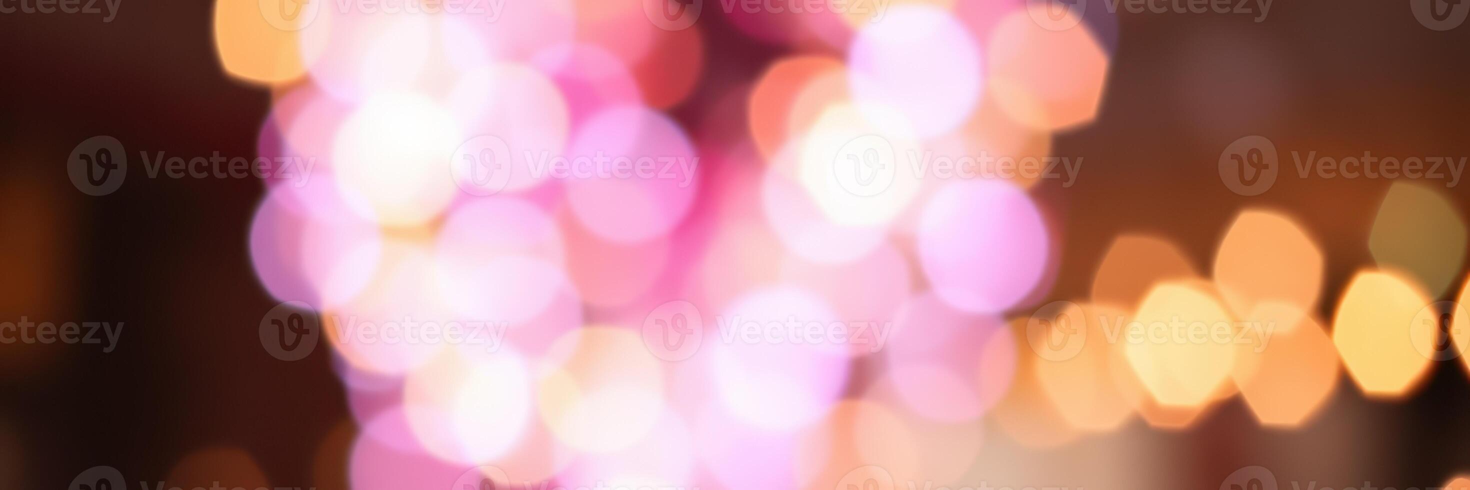 Colorful blurred lights create a vibrant atmosphere at a festive nighttime event in a city photo
