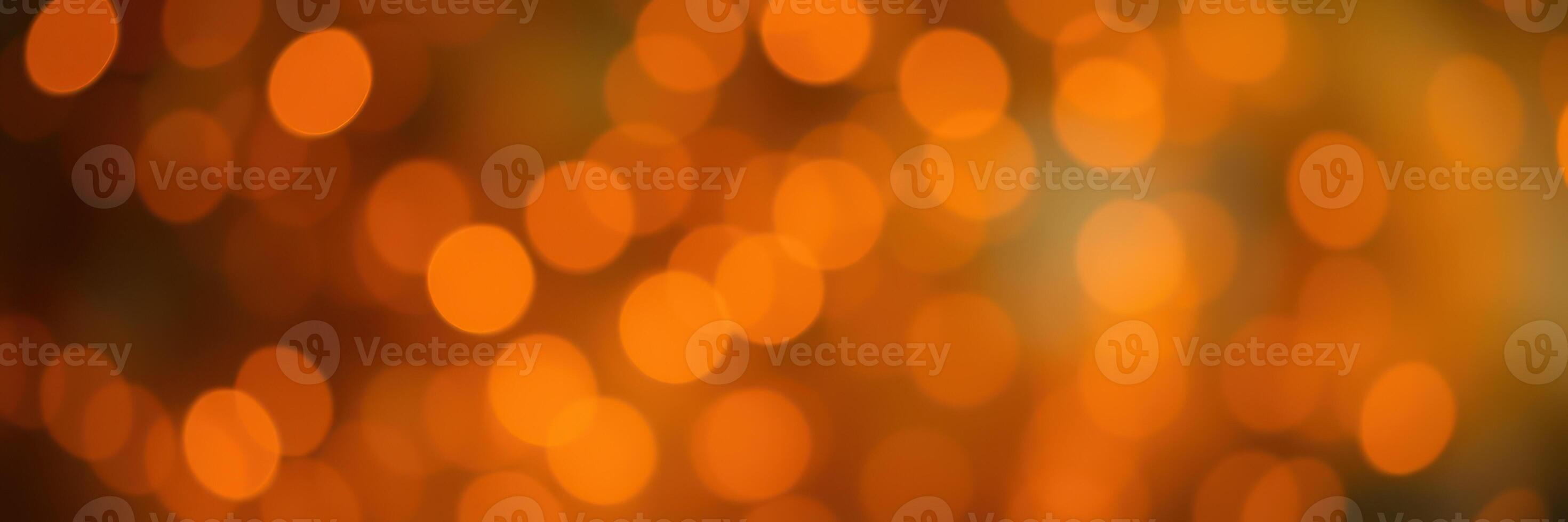 Warm orange lights create a festive atmosphere at an evening gathering in a cozy outdoor setting during autumn photo