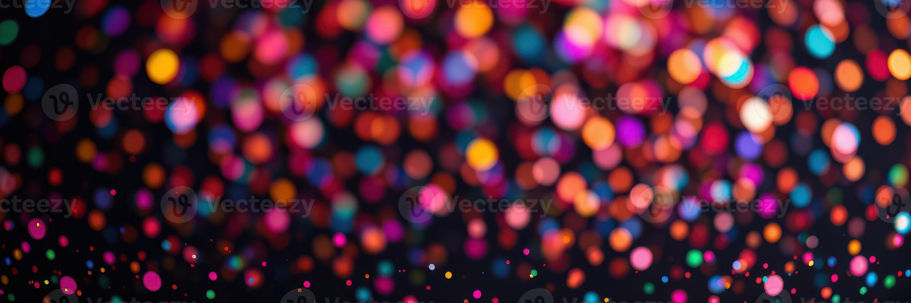 Colorful bokeh lights create a mesmerizing background suitable for celebrations or artistic projects photo