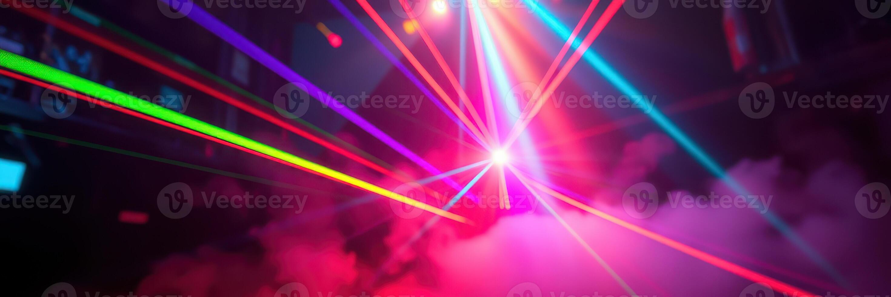 Colorful laser display creates vibrant atmosphere at nighttime event in urban setting photo