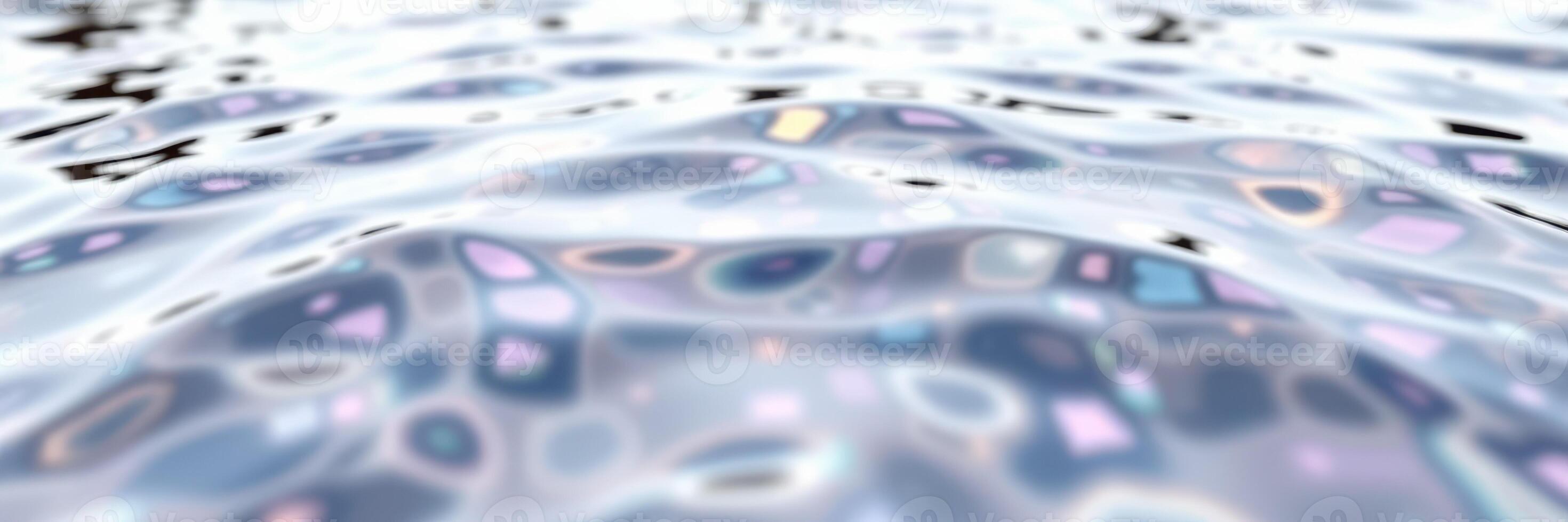 Rippling water surface reflecting light and colors during a sunny day on a tranquil lake photo