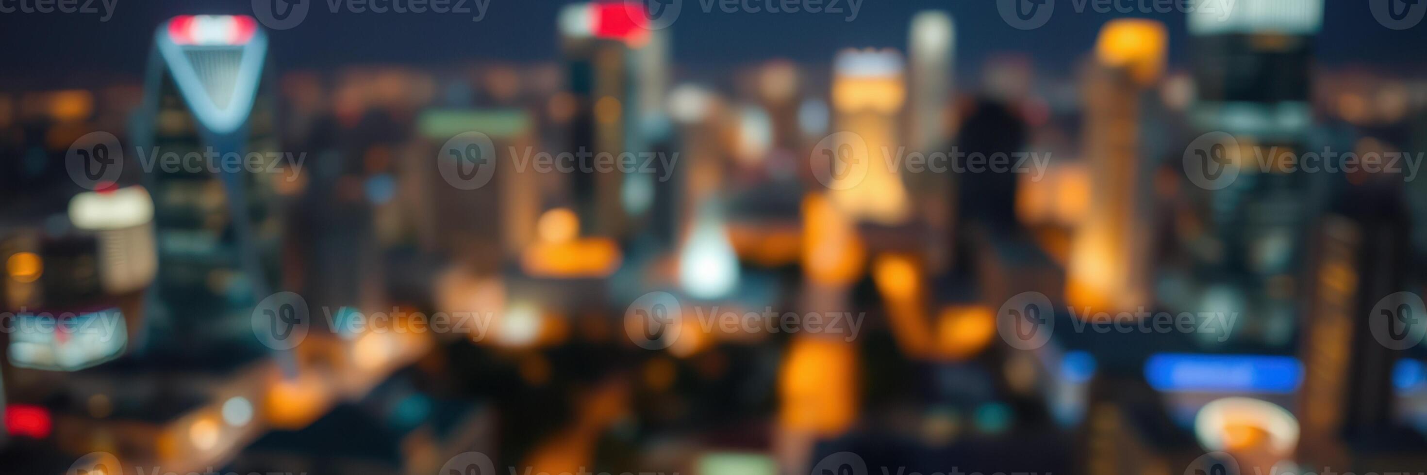 City skyline illuminated at night with blurred lights and buildings creating a vibrant urban atmosphere photo