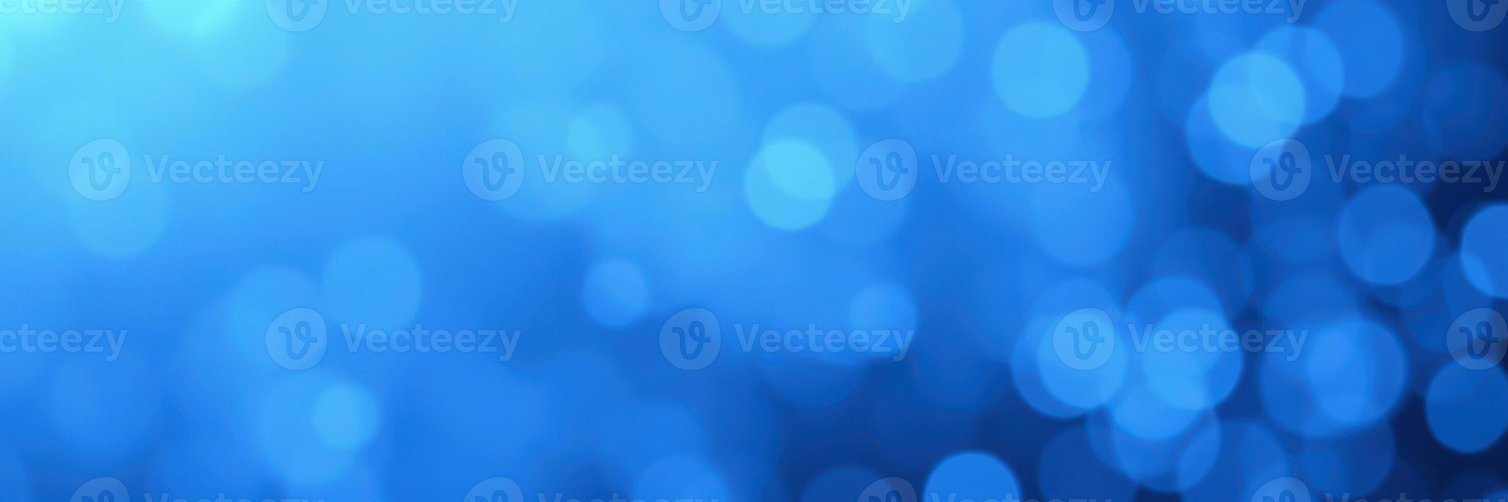 Soft blue bokeh background creates a calming atmosphere perfect for various design projects photo