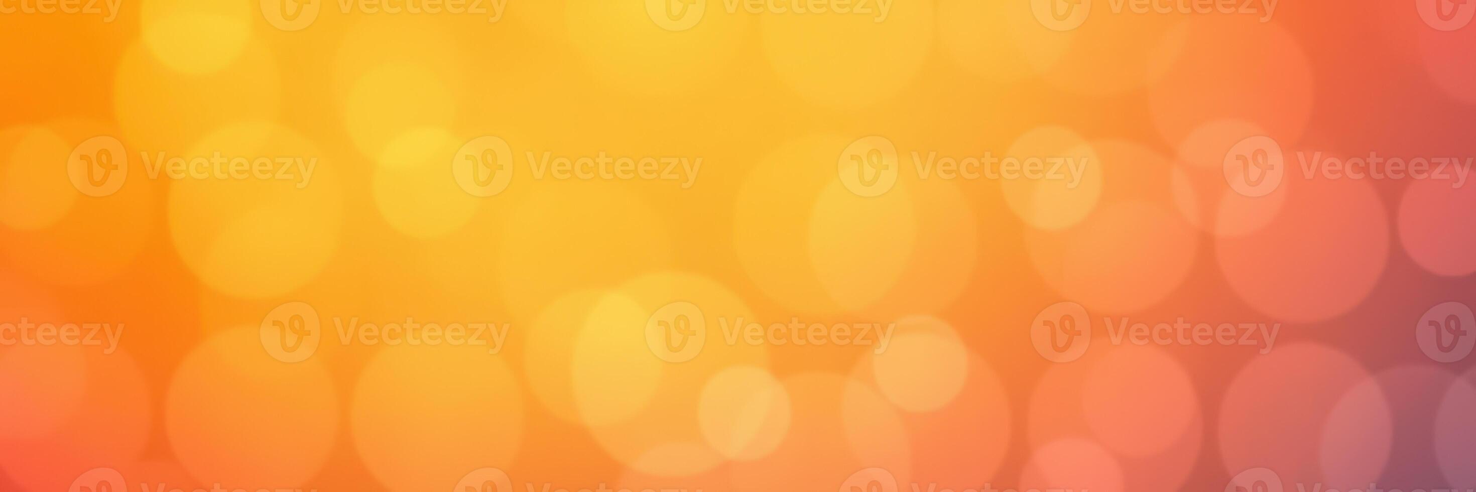 Warm autumn colors blend in a vibrant bokeh background for creative design and projects photo