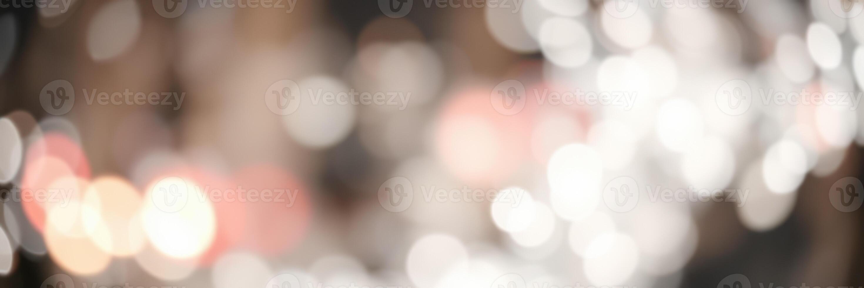Soft bokeh lights create a dreamy atmosphere at a festive evening gathering in a cozy space photo
