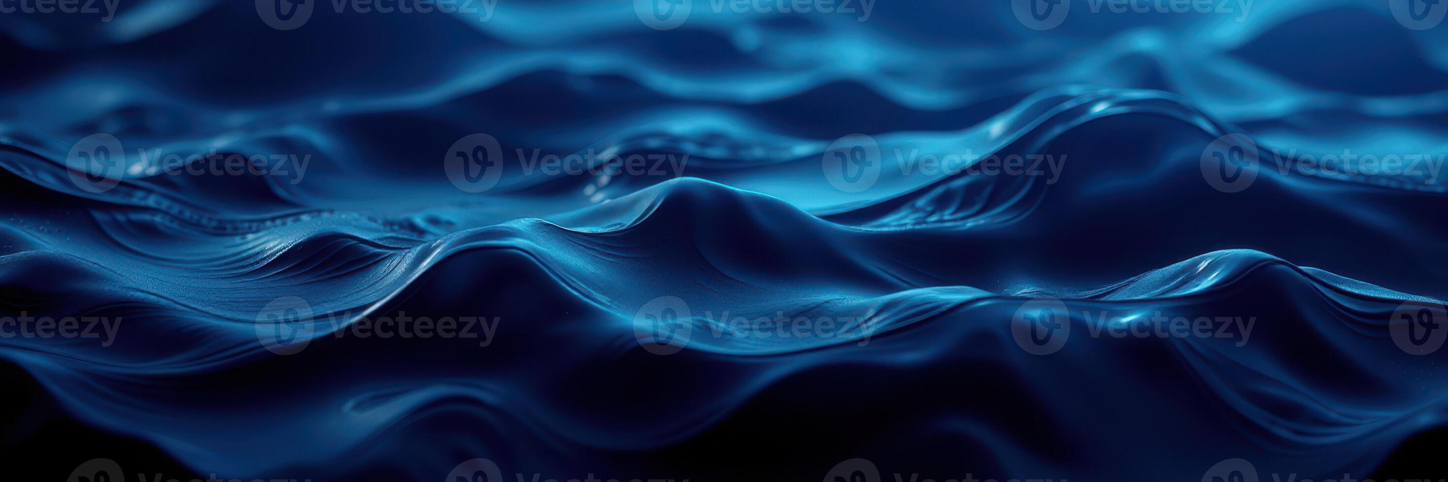 Waves form a mesmerizing pattern in deep blue water under soft lighting at night photo