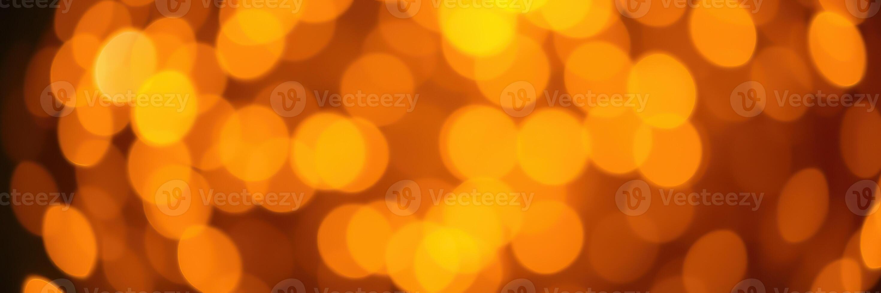 Warm golden bokeh lights create an enchanting atmosphere during a festive celebration in the evening photo