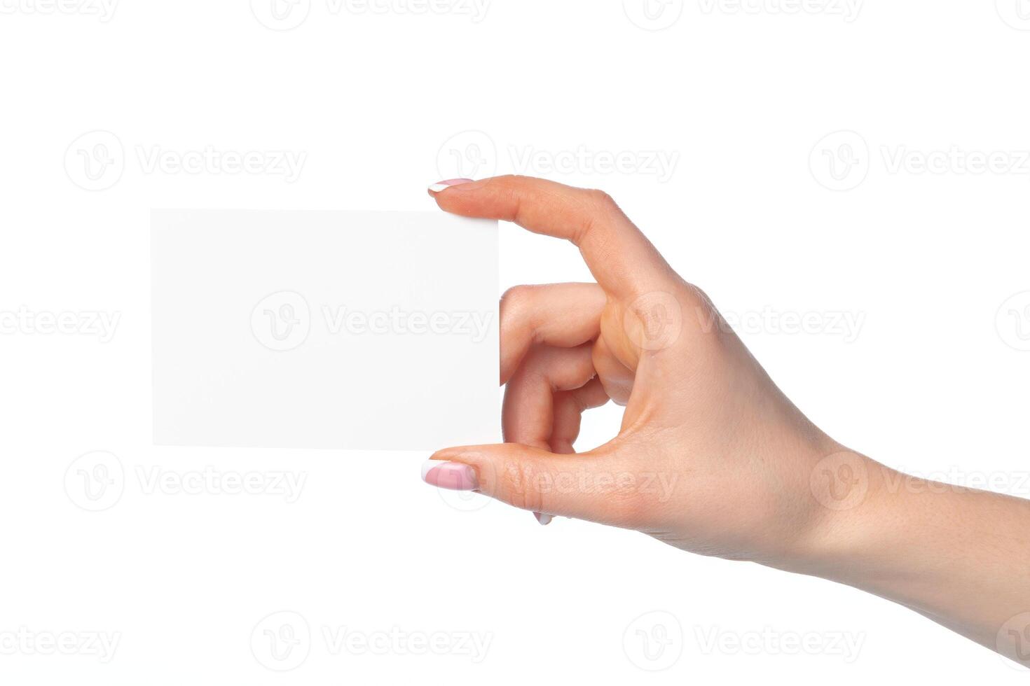 Woman's hand with blank white business card isolated on white photo