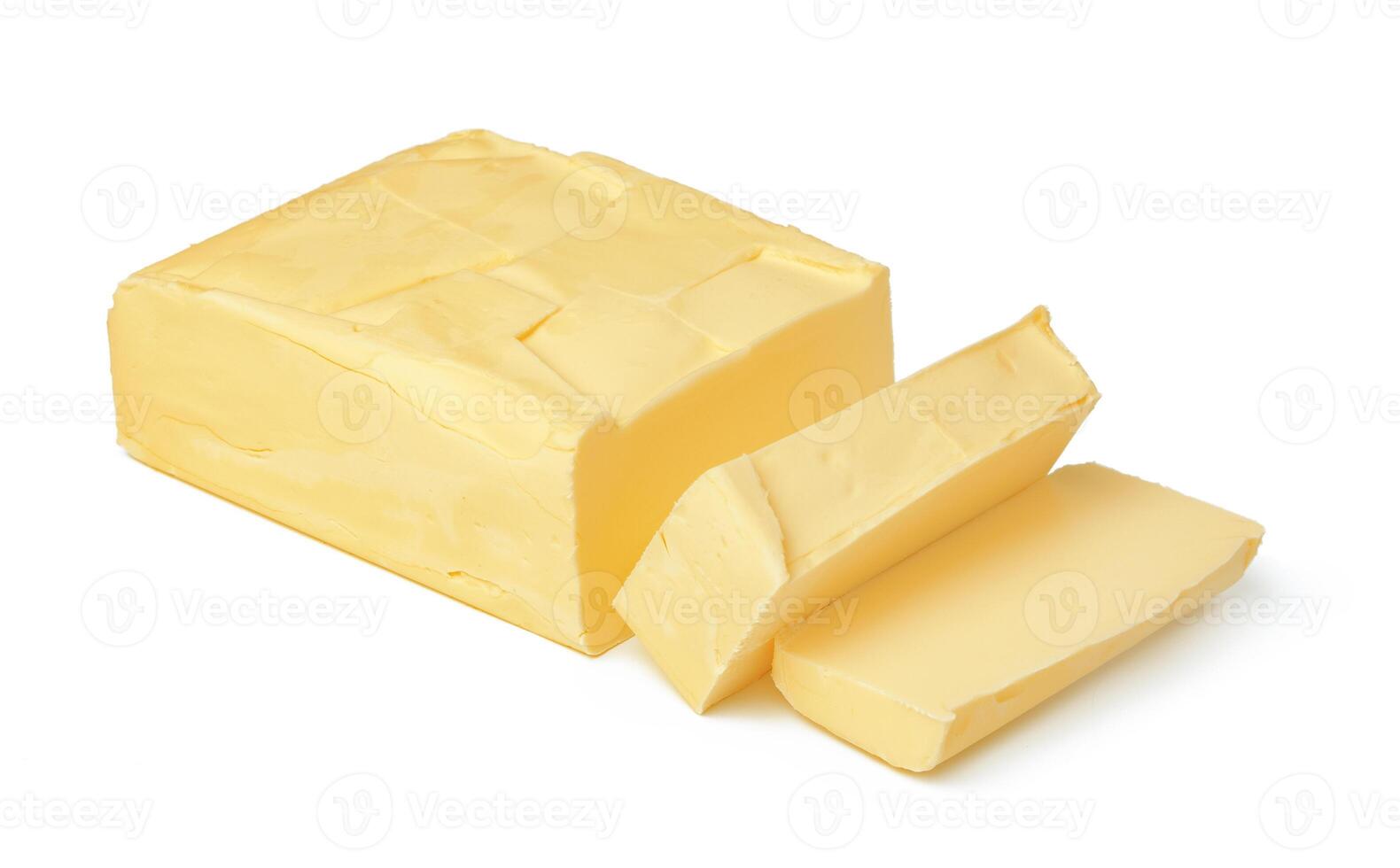 Block of butter isolated on white background photo