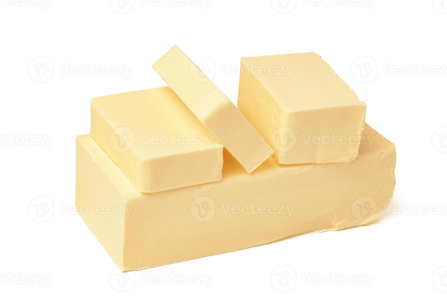 Block of butter isolated on white background photo