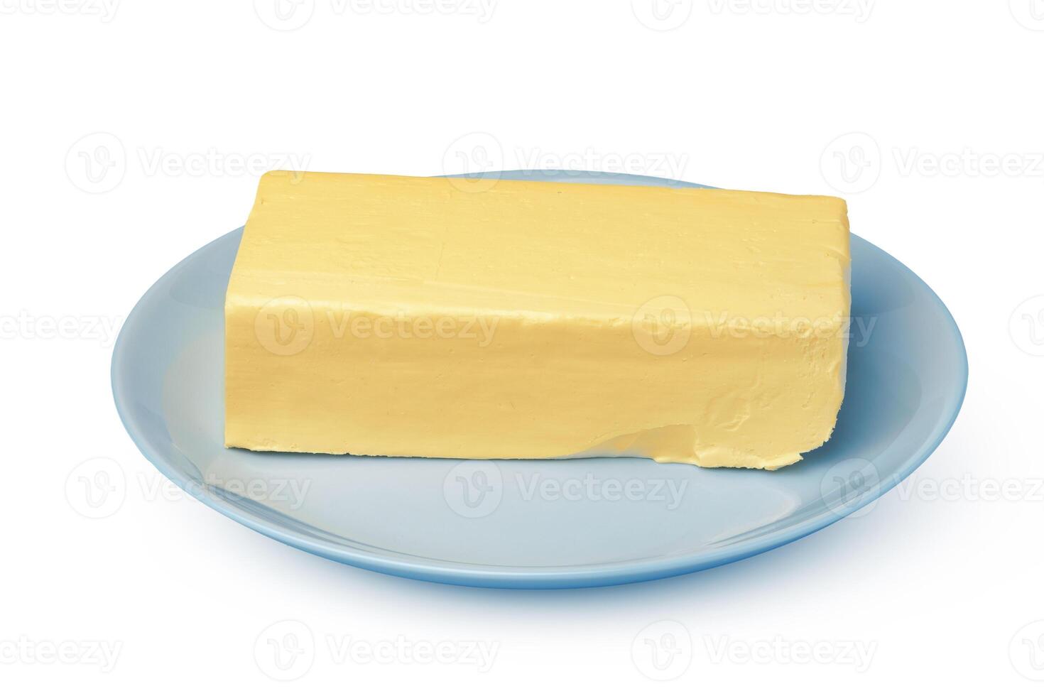 Butter on white plate isolated on white background photo
