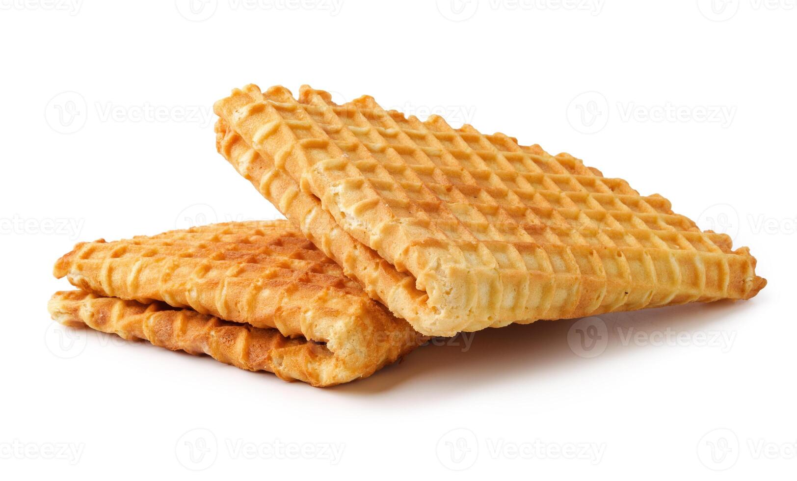 Crispy waffles stacked on a white background ready to be enjoyed for breakfast or dessert photo