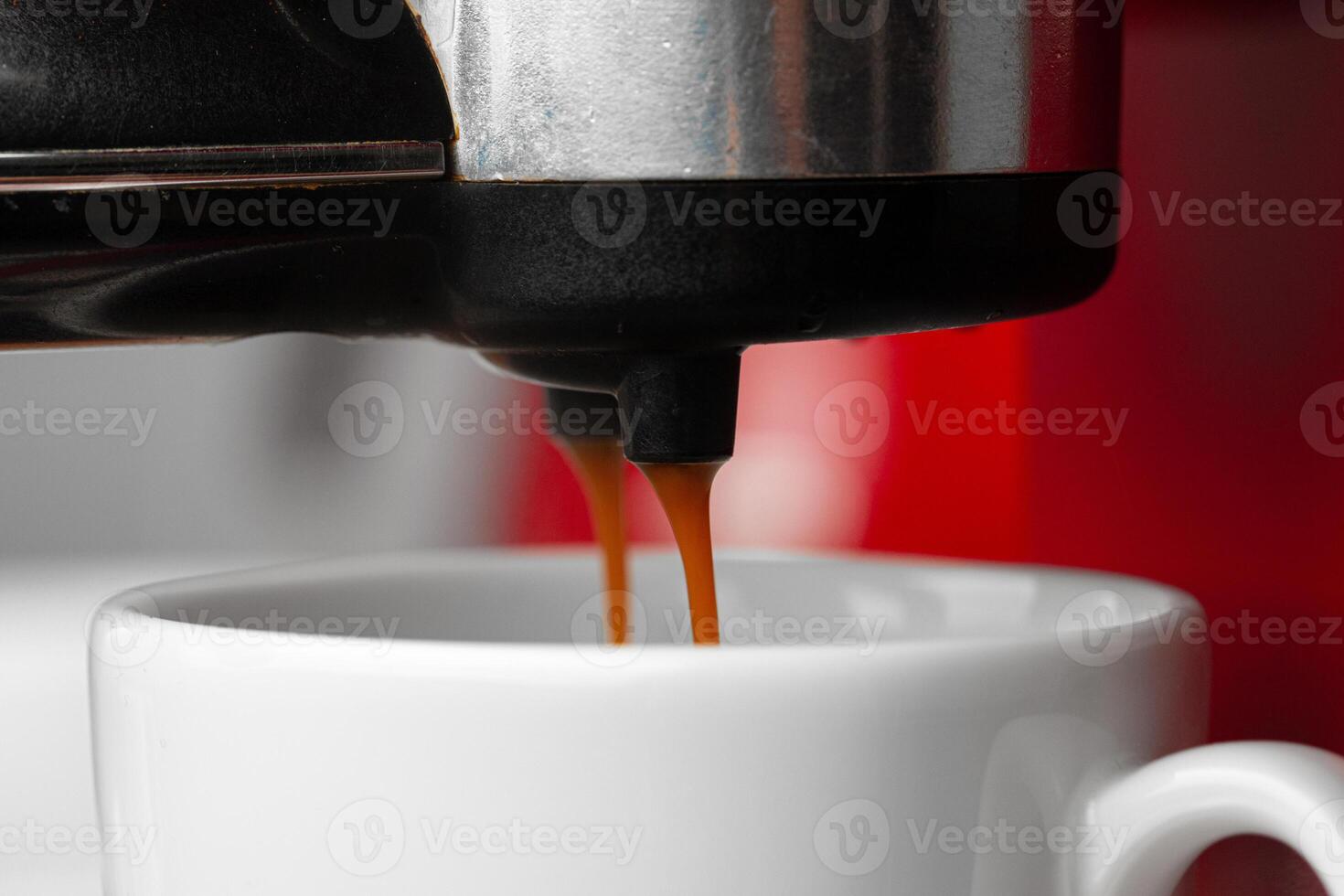 Americano coffee pouring from home coffee machine photo