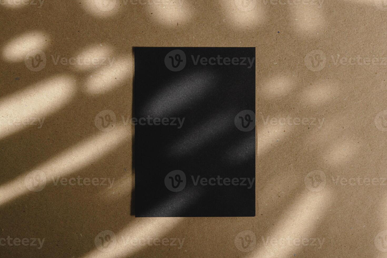 Black business cards on cork board table photo