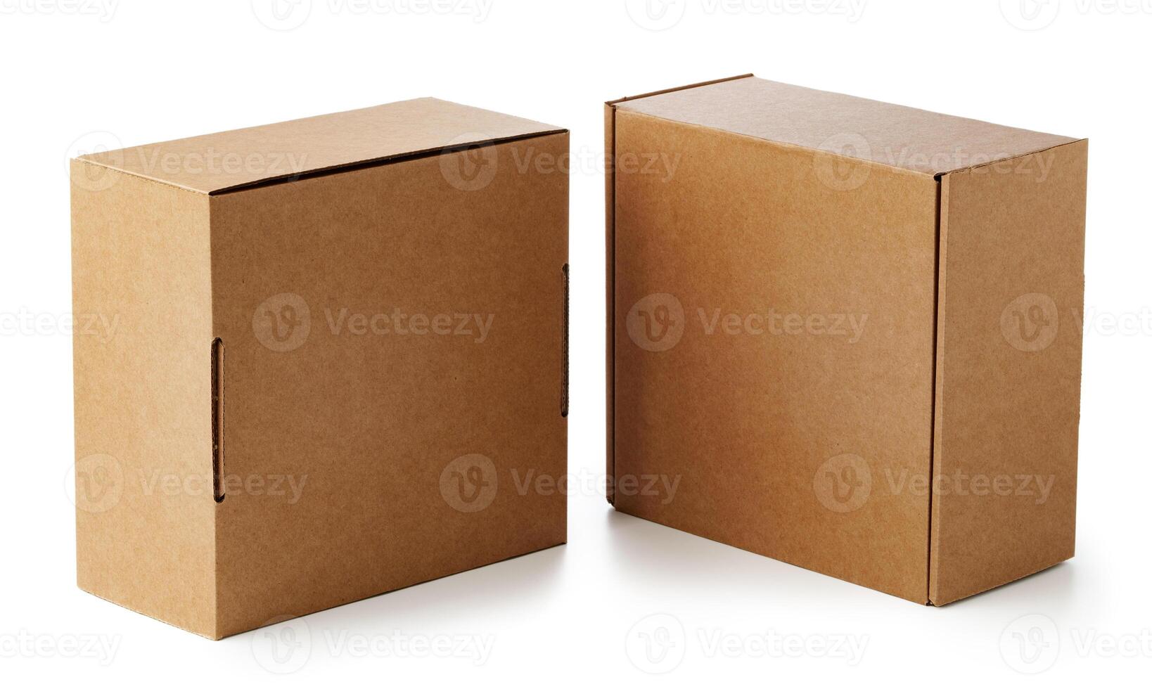 Two brown cardboard boxes stacked together on a plain surface photo