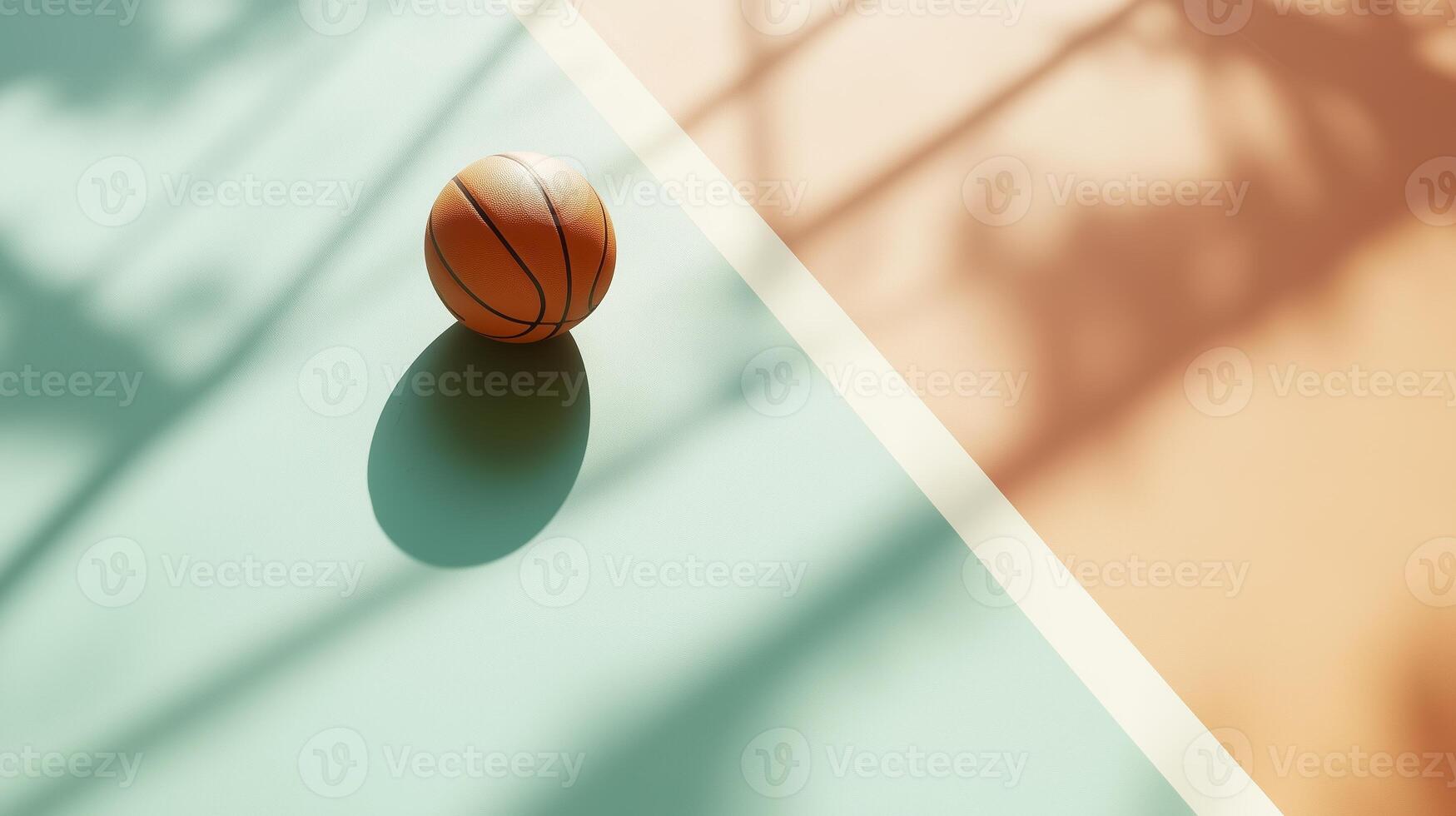 Basketball resting on court with sunny shadows and vibrant colors in an urban environment during late afternoon photo