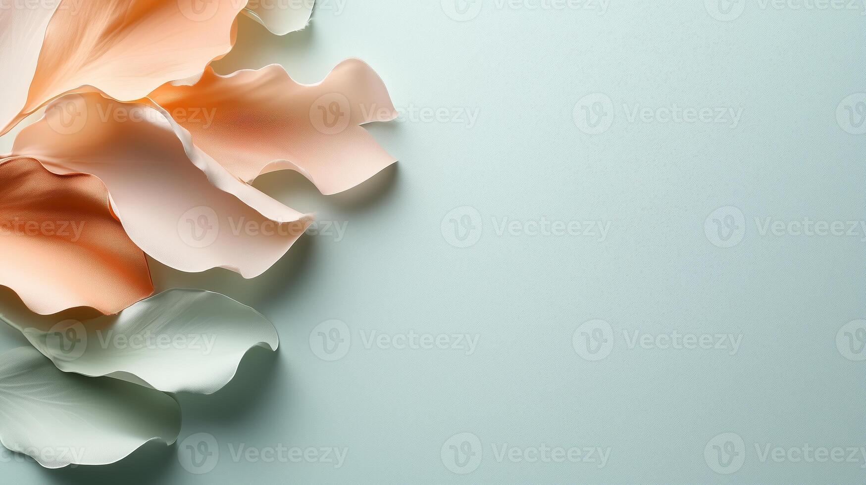 Delicate paper petals arranged on a soft blue background for creative decor and design inspiration photo