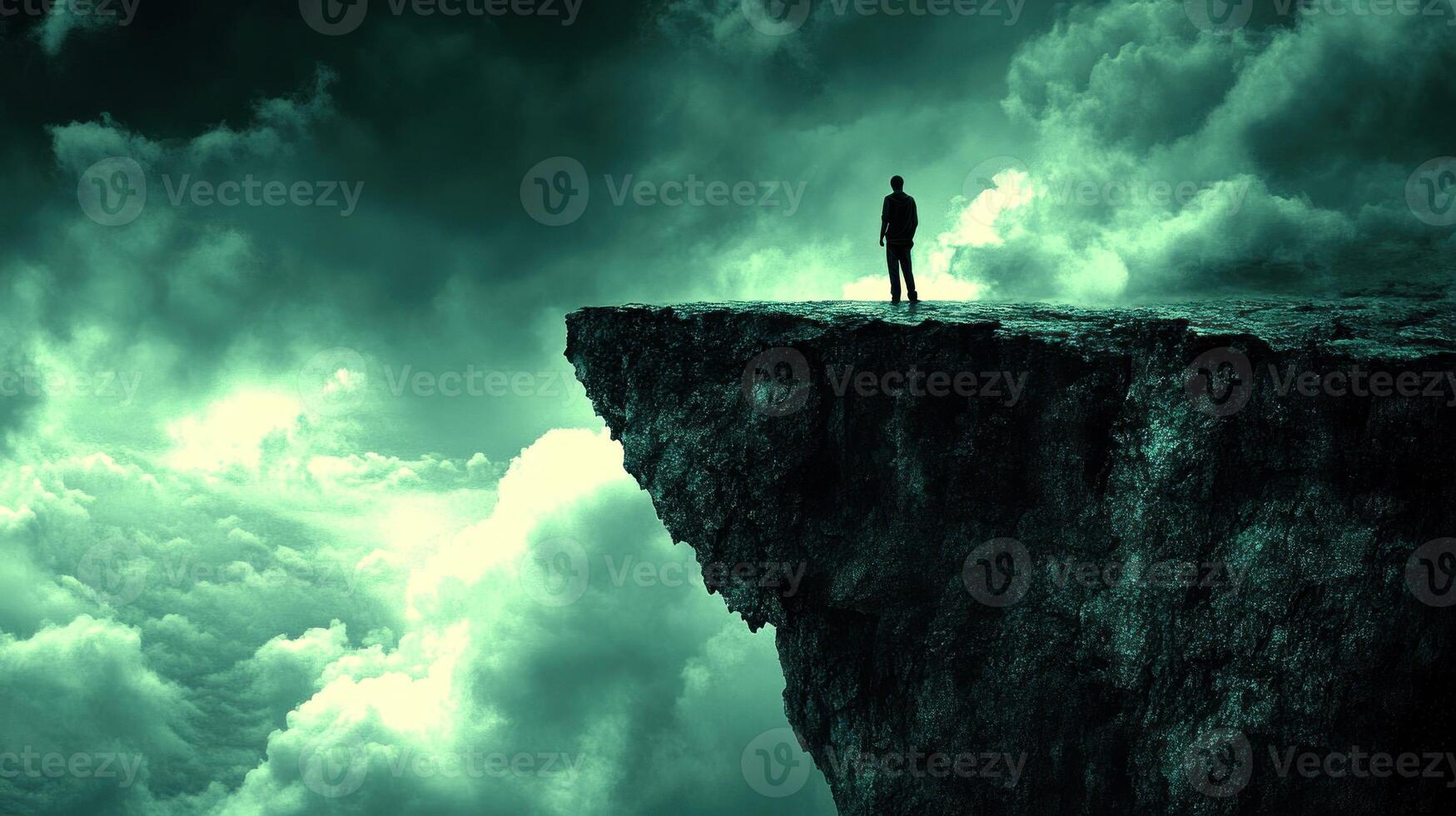 Individual gazes at expansive clouds from a high cliff surrounded by an otherworldly atmosphere photo