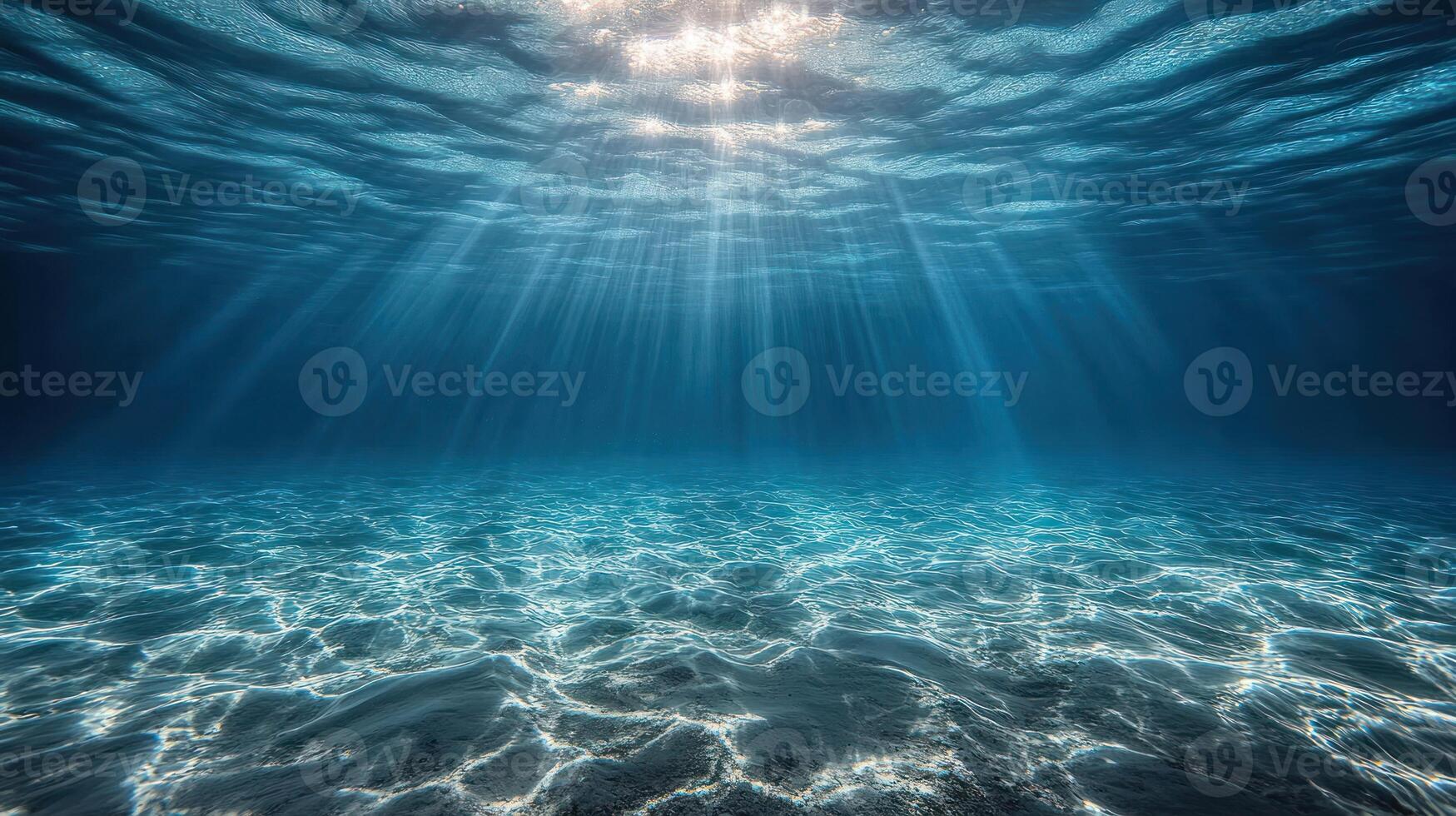 Sunlight radiates through tranquil ocean water, illuminating the vibrant underwater environment photo