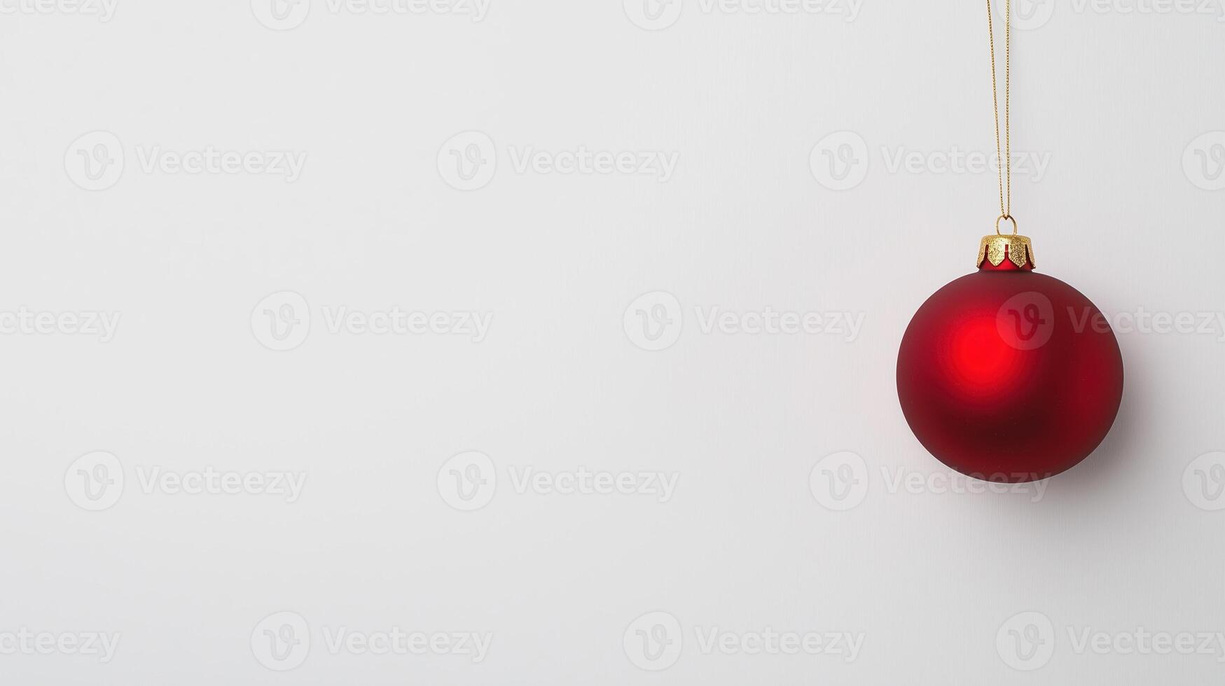 Minimalist Christmas Ornament On White Background With Red Bauble Hanging, Clean Design For Holiday Greetings And Seasonal Advertising, Emphasizing Simplicity And Elegance In Festive Decor photo