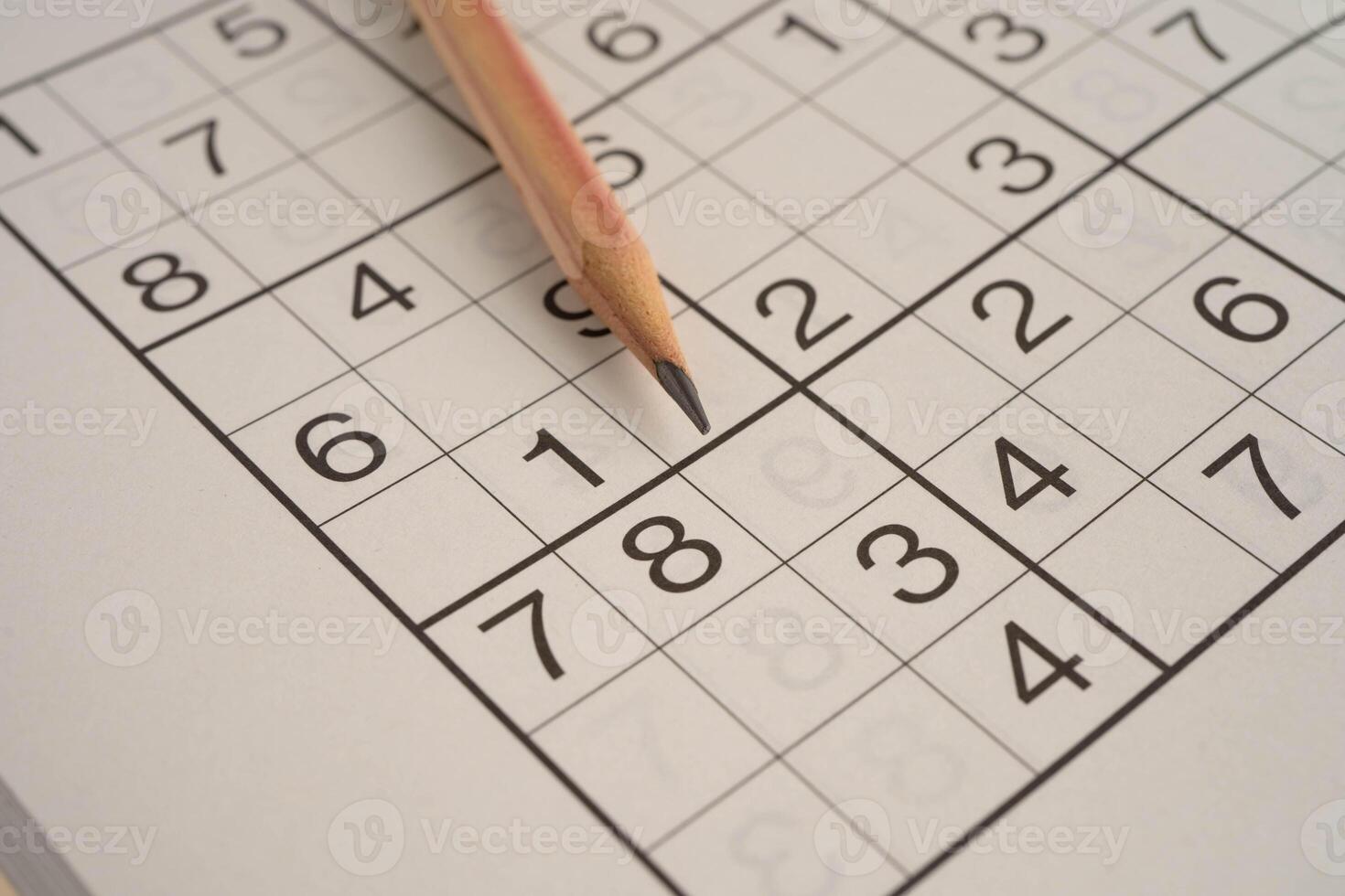 Sudoku puzzle, game to play for keep you brain younger for developing Alzheimer disease in senior patient. photo
