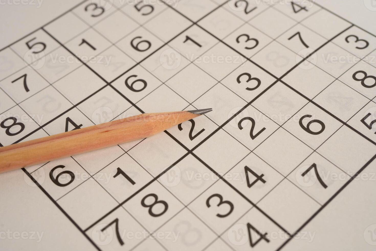 Sudoku puzzle, game to play for keep you brain younger for developing Alzheimer disease in senior patient. photo