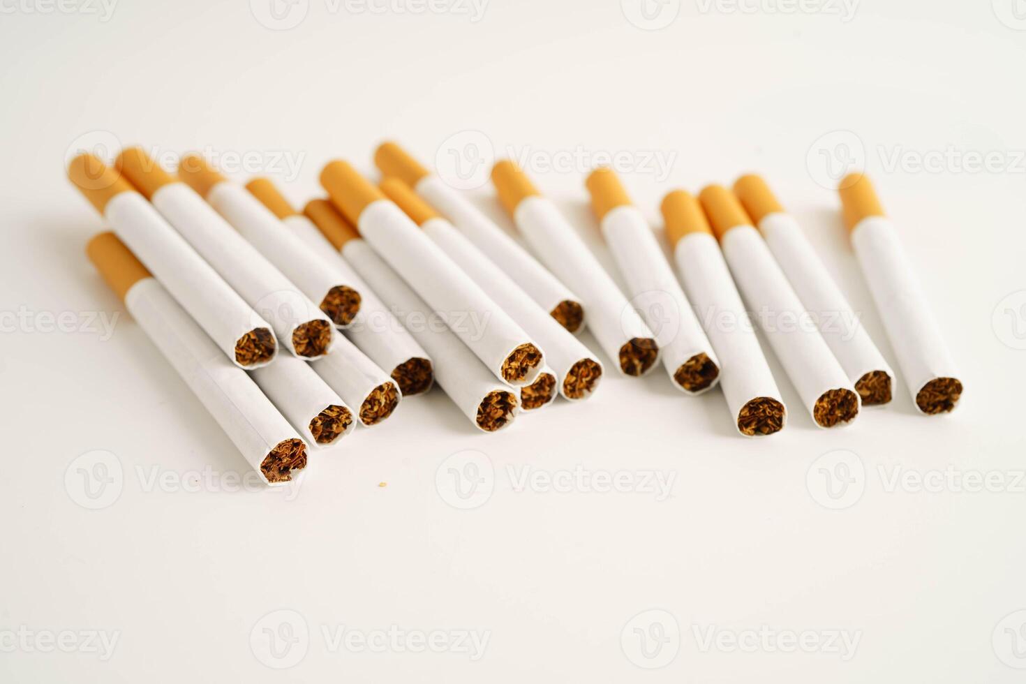 Cigarette, roll tobacco in paper with filter tube, No smoking. photo