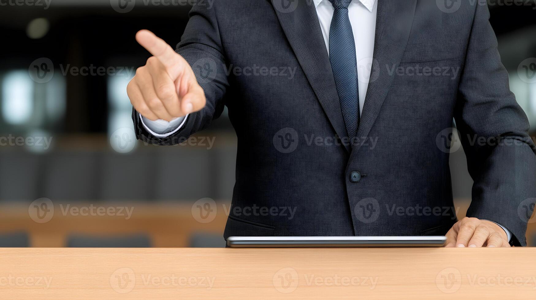 Businessman utilizing a digital tablet for a compelling presentation, capturing attention in a professional setting photo