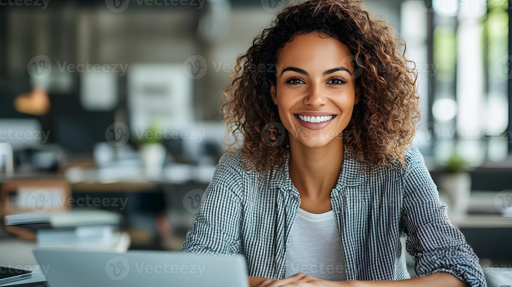 Female owner consulting customer on purchase, using technology for product info, stylish small business environment photo