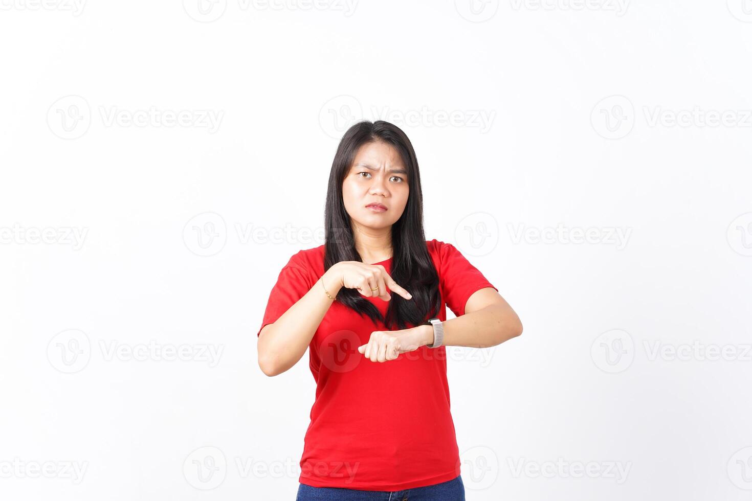 Pointing to watch and Angry for late Of Beautiful Asian Woman wearing red shirt Isolated On White Background photo