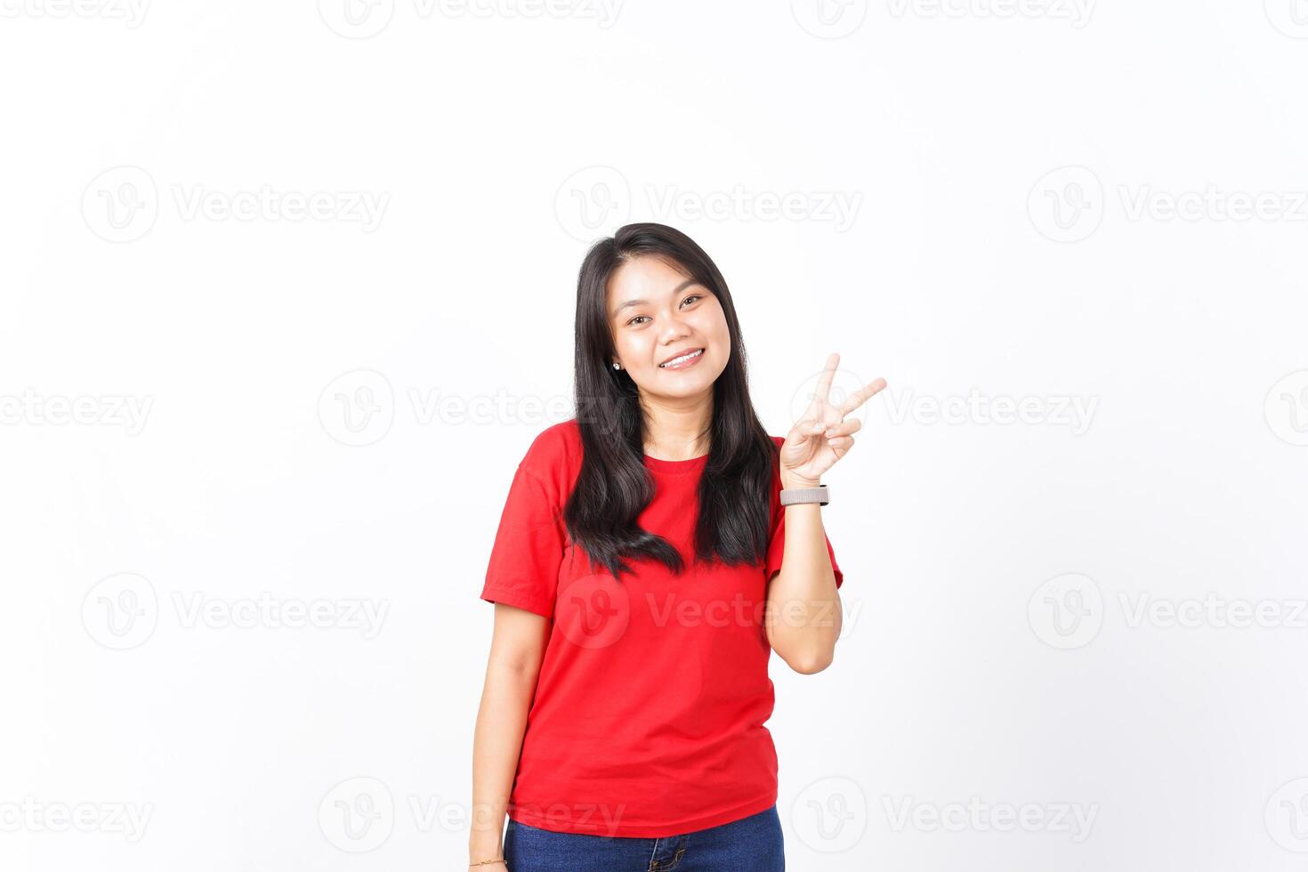 Showing Peace Sign or Victory sign Of Beautiful Asian Woman wearing red shirt Isolated On White Background photo