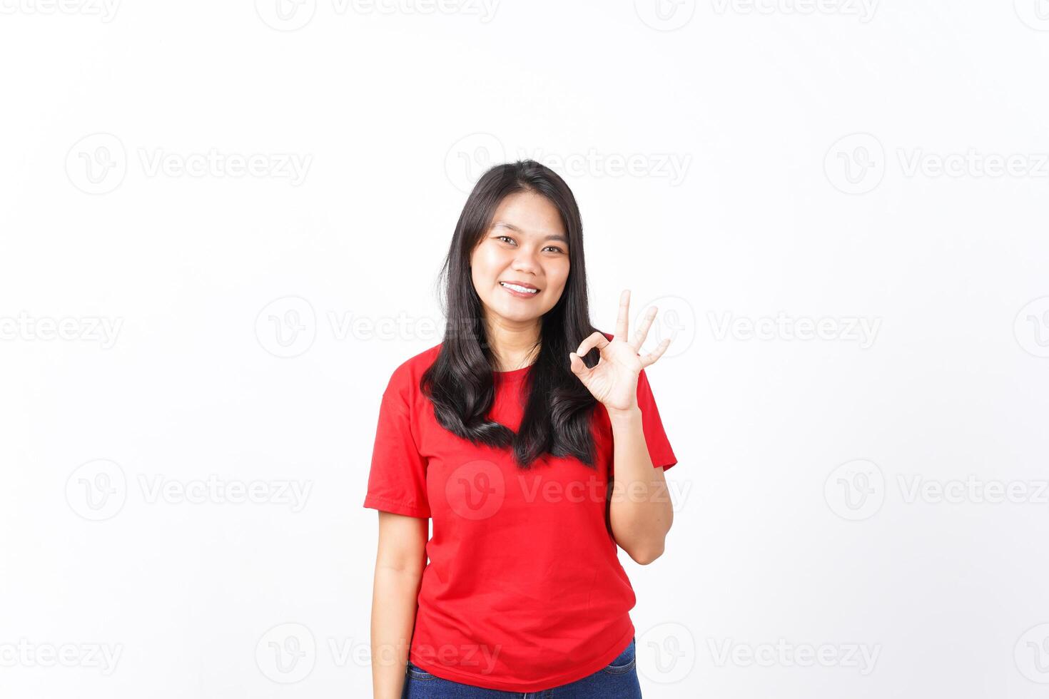 Showing Okay Sign, Approve Concept Of Beautiful Asian Woman Wearing Red Shirt Isolated On White Background photo
