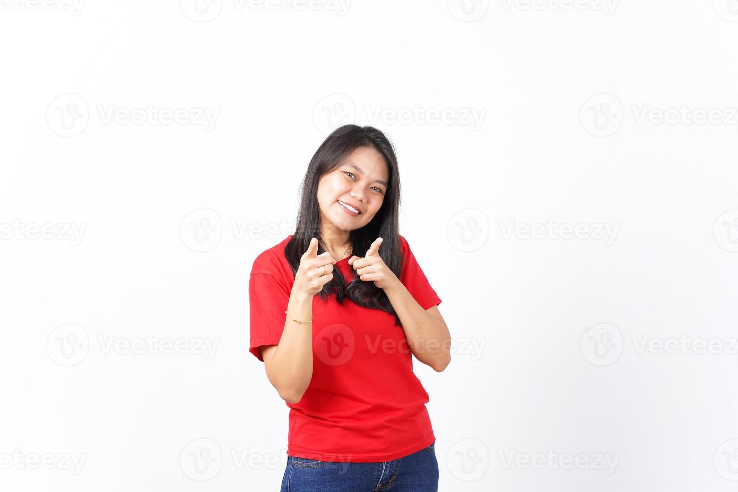Smiling and Pointing at camera or you, want you gesture Of Beautiful Asian Woman wearing red shirt Isolated On White Background photo