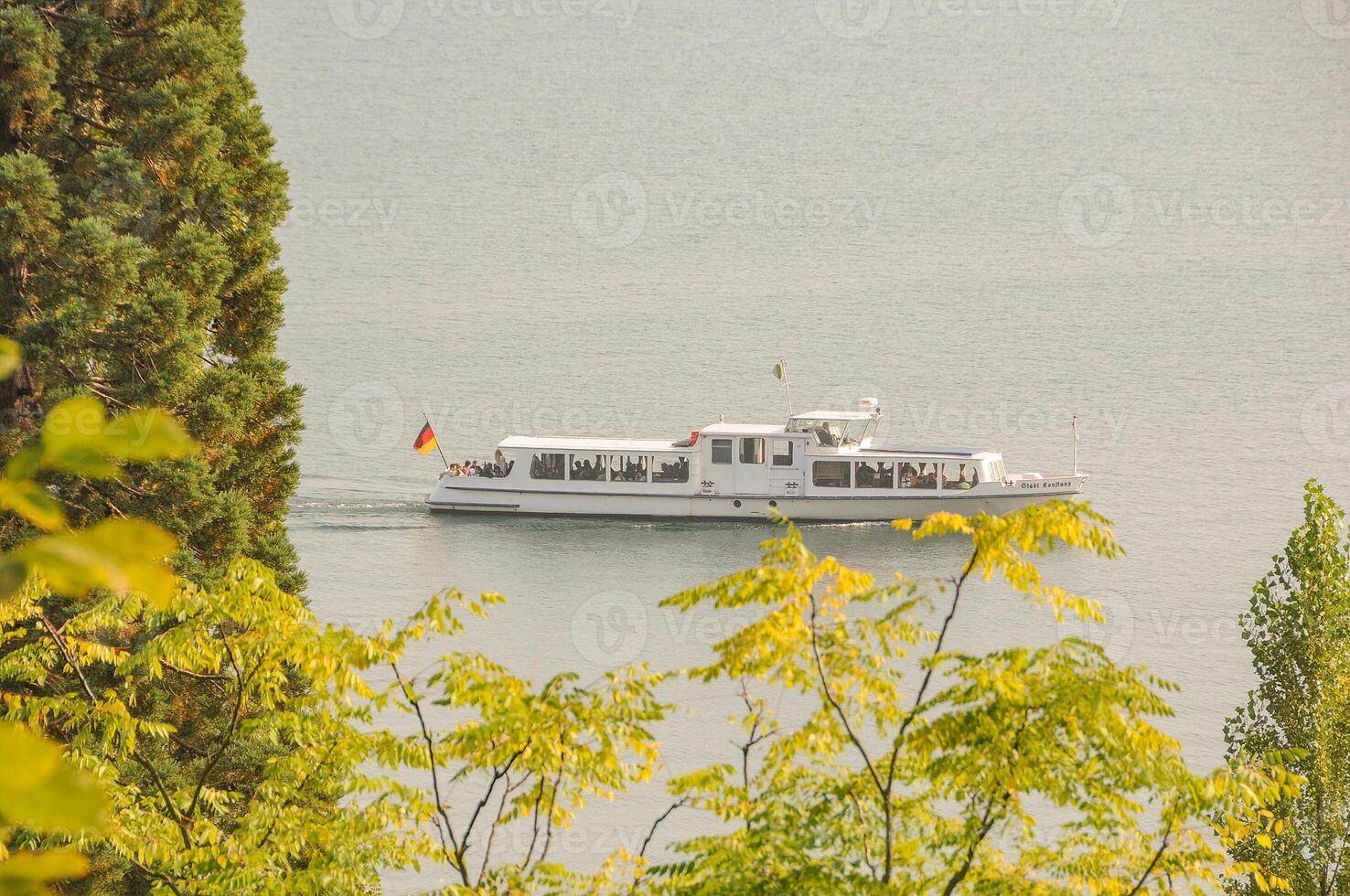 A boat is traveling down a river photo