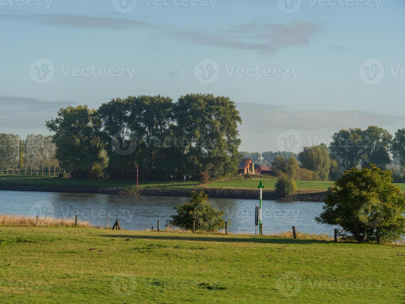 A field with a grassy area at the rhine photo