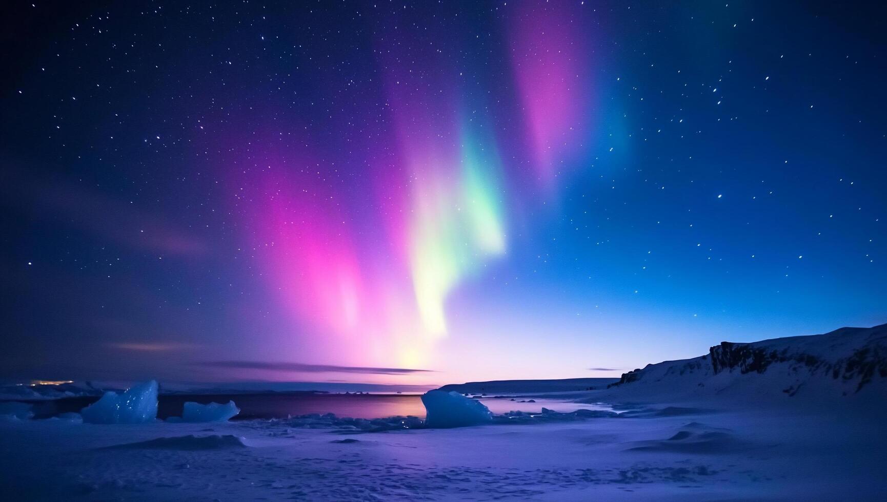 The aurora borealis is seen over the ocean photo