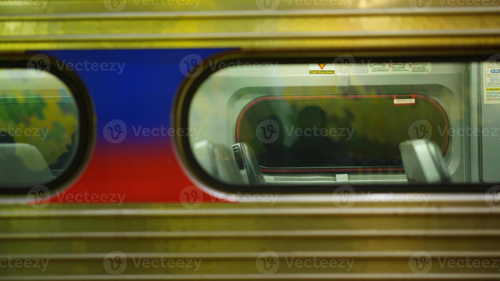 The railway station view with the wagons stopping on the iron tracks photo