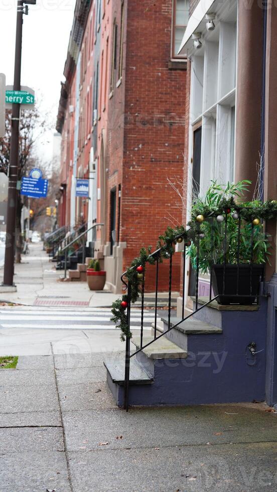 The street view with the christmas decoration along the doors and windows during the christmas days photo