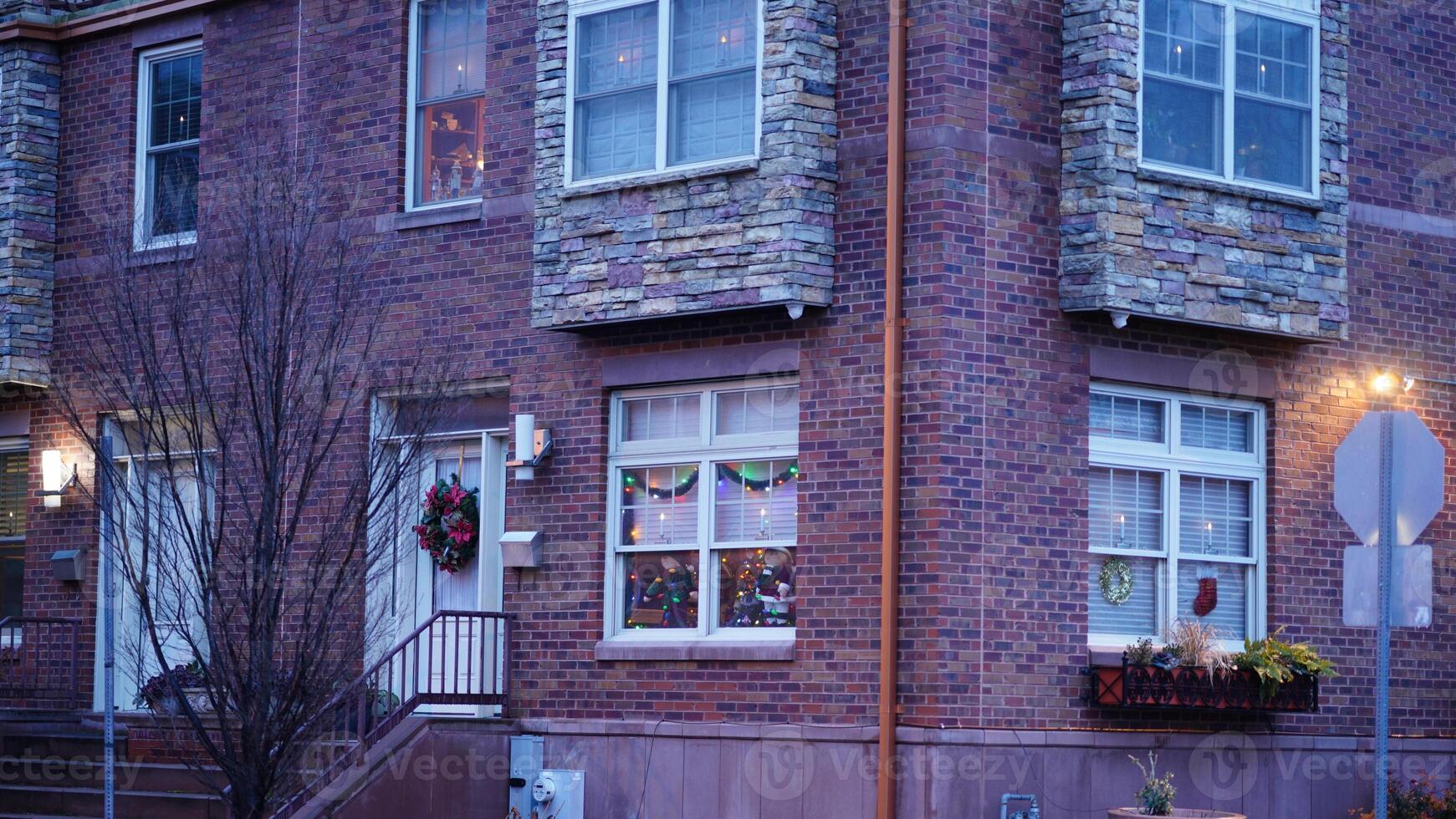 The street view with the christmas decoration along the doors and windows during the christmas days photo