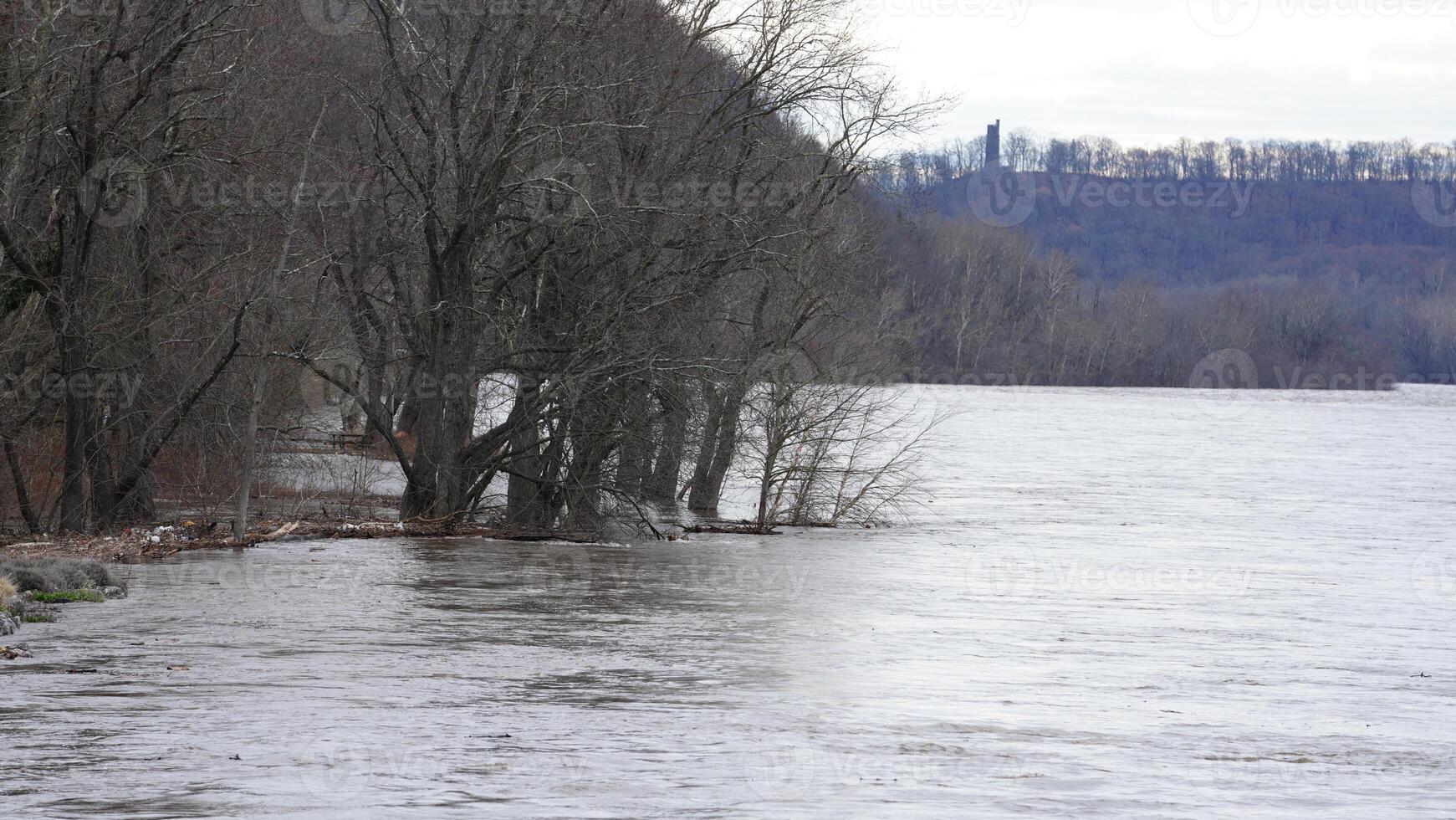 The Delaware river is flood after several raining days in winter photo