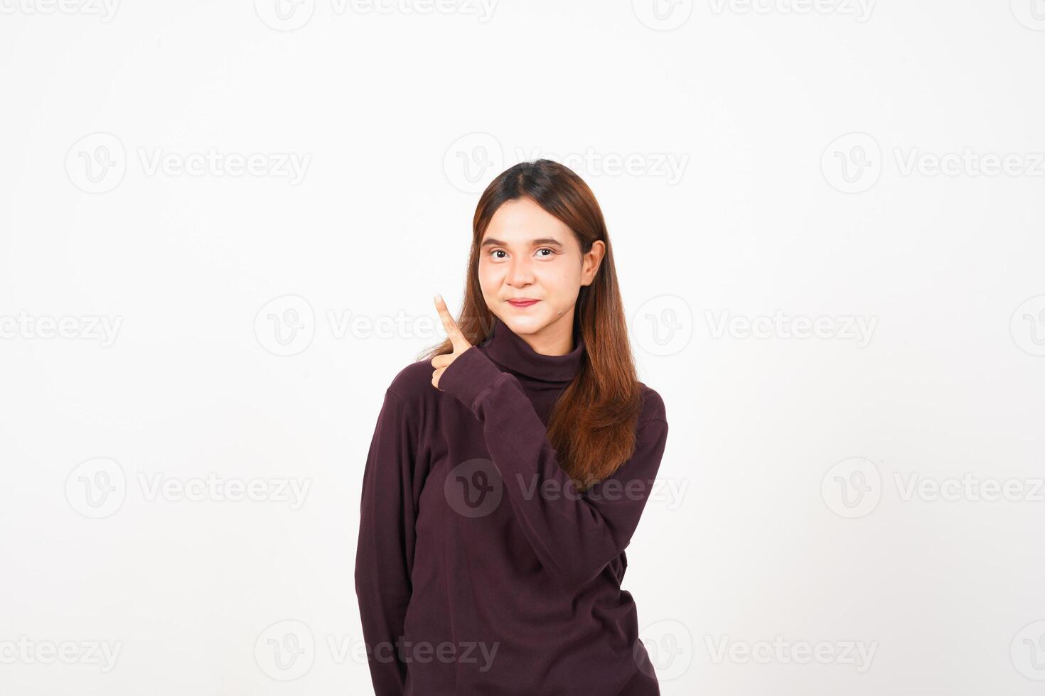 Smiling and Pointing side copy space showing advertising Of Beautiful Asian Woman Isolated On White Background photo