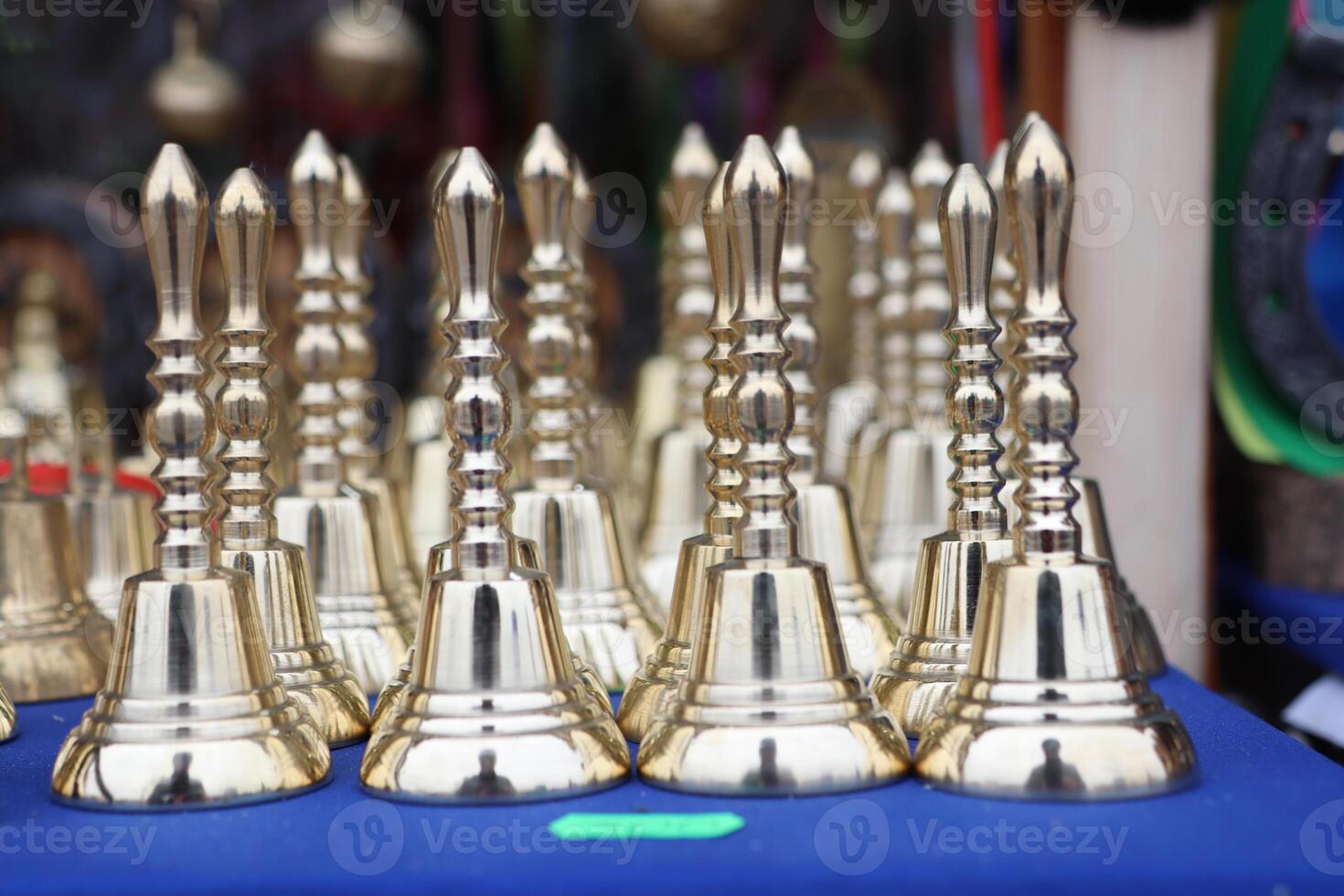 A Beautiful Collection of Unique and Decorative Golden Bells for Your Elegant Space and Events photo