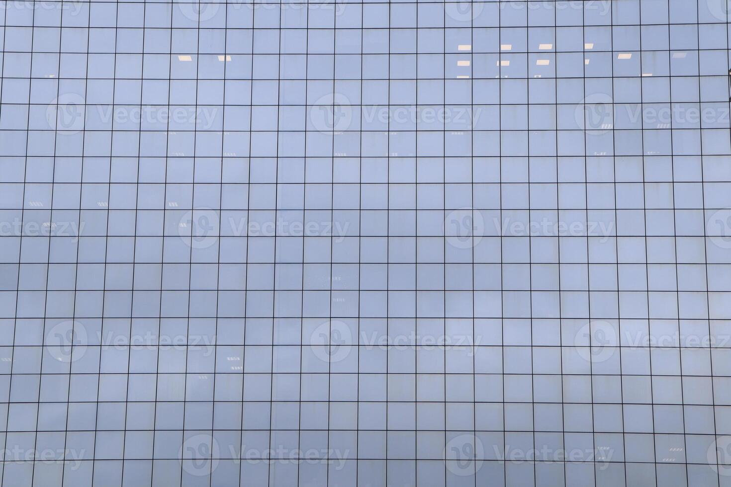 The Modern Glass Building Facade features a distinctive and striking Grid Pattern design photo