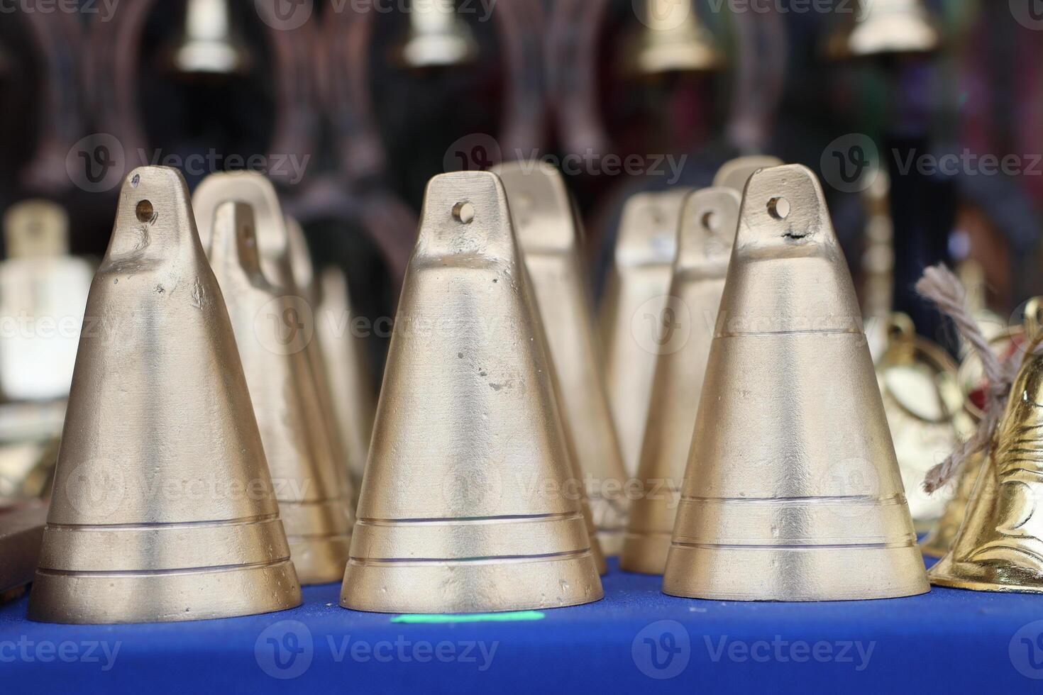 A Collection of Beautiful and Decorative Golden Bells, Perfect for Various Crafts and Events photo