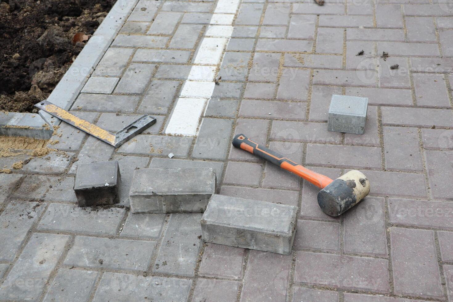 Essential Tools and Materials Required for the Installation of Paving Stones and Paths photo