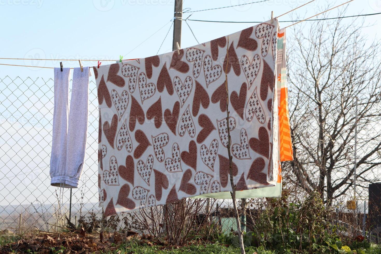 A Colorful Clothesline Adorned with a Charming Heart Pattern for Your Enjoyment and Delight photo